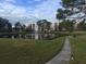 Serene pond with a fountain, enhancing the community landscape at 5973 Terrace Park N Dr # 208, St Petersburg, FL 33709