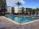 Refreshing community pool with ample deck space for lounging at 5973 Terrace Park N Dr # 208, St Petersburg, FL 33709