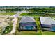 Beautifully landscaped home with a screened-in pool and lush backyard at 624 Blue Shell Loop, Sarasota, FL 34240