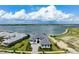 Gorgeous lakefront home, with expansive waterfront views and well manicured lawn at 624 Blue Shell Loop, Sarasota, FL 34240
