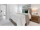 Comfortable bedroom features a plush bed, soft lighting, and ample closet space at 624 Blue Shell Loop, Sarasota, FL 34240