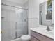 Clean bathroom with shower/tub combo, vanity, and window at 6700 S Gator Creek Blvd, Sarasota, FL 34241