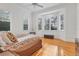Spacious bedroom with bay window, hardwood floors, and ample natural light at 6700 S Gator Creek Blvd, Sarasota, FL 34241