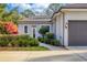 Welcoming front entry with walkway and landscaping at 6700 S Gator Creek Blvd, Sarasota, FL 34241
