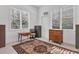 Home office with built-in cabinets and desk at 6700 S Gator Creek Blvd, Sarasota, FL 34241
