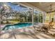 Inviting pool and spa with screened enclosure at 6700 S Gator Creek Blvd, Sarasota, FL 34241