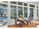 Relaxing sunroom with pool view and plenty of natural light at 6700 S Gator Creek Blvd, Sarasota, FL 34241
