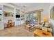 Bright Gathering room with built-in shelving and access to a patio at 6847 Bay Hill Dr, Lakewood Ranch, FL 34202