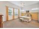 Spacious main bedroom with large windows and carpeted floors at 6847 Bay Hill Dr, Lakewood Ranch, FL 34202