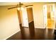 Bedroom with wood flooring, closet, and connected bathroom at 731 Cristelle Jean Dr, Ruskin, FL 33570