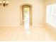 Bright living space with an archway to the entry, tile flooring and natural light at 731 Cristelle Jean Dr, Ruskin, FL 33570