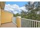 Private balcony overlooking a lush green landscape at 7325 Black Walnut Way, Lakewood Ranch, FL 34202