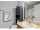 Clean bathroom with vanity, toilet and shower at 7325 Black Walnut Way, Lakewood Ranch, FL 34202