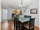 Dining area with six chairs and kitchen views at 7325 Black Walnut Way, Lakewood Ranch, FL 34202