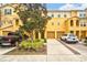 Two-story townhome with two-car garage and landscaped front yard at 7325 Black Walnut Way, Lakewood Ranch, FL 34202