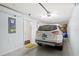 Attached garage with space for one vehicle and storage at 7325 Black Walnut Way, Lakewood Ranch, FL 34202