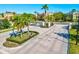 Gated entrance to the community with palm trees at 7325 Black Walnut Way, Lakewood Ranch, FL 34202