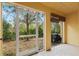 Screened porch with access to backyard at 7325 Black Walnut Way, Lakewood Ranch, FL 34202