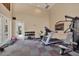 Fitness center with treadmill, weights, and exercise bike at 7664 Plantation Cir, Bradenton, FL 34201