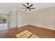 Spacious living room featuring hardwood floors and an open floor plan at 7664 Plantation Cir, Bradenton, FL 34201