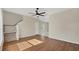 Bright living room with hardwood floors and view to the kitchen at 7664 Plantation Cir, Bradenton, FL 34201