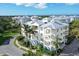 Aerial view of building, showcasing its exterior and landscaping at 7840 34Th W Ave # 203, Bradenton, FL 34209