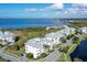 Aerial view of community buildings and waterfront at 7840 34Th W Ave # 203, Bradenton, FL 34209
