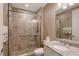 Updated bathroom with a walk-in shower, tile flooring and granite vanity at 7840 34Th W Ave # 203, Bradenton, FL 34209