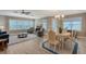 Bright dining room with a round table and chairs, near the living room at 7840 34Th W Ave # 203, Bradenton, FL 34209