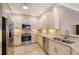 Well-equipped kitchen featuring stainless steel appliances and granite countertops at 7840 34Th W Ave # 203, Bradenton, FL 34209