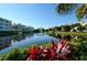 Tranquil lake view with lush landscaping and building view at 7840 34Th W Ave # 203, Bradenton, FL 34209