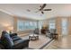 Spacious living room with comfortable seating and large windows at 7840 34Th W Ave # 203, Bradenton, FL 34209