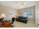 Home office featuring a desk, chair, and comfortable couch at 7840 34Th W Ave # 203, Bradenton, FL 34209