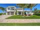 Two-story home with a two car garage and landscaping at 8013 20Th W Pl, Bradenton, FL 34209