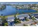 Aerial view of lakeside homes showcasing the desirable community layout and waterfront access at 9514 Colonial Dr, Bradenton, FL 34210