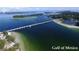Panoramic aerial shot of the bridge and Gulf of Mexico, showcasing waterfront property at 9514 Colonial Dr, Bradenton, FL 34210