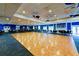Spacious ballroom with dance floor, perfect for community events at 9514 Colonial Dr, Bradenton, FL 34210