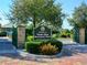 Welcome sign to Palma Sola Botanical Park, surrounded by lush greenery and manicured gardens at 9514 Colonial Dr, Bradenton, FL 34210