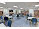 A bright community library with ample seating, bookshelves, and a welcoming atmosphere at 9514 Colonial Dr, Bradenton, FL 34210
