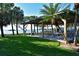Open-air pavilion with picnic tables near the water provides a delightful space for outdoor gatherings and relaxation at 9514 Colonial Dr, Bradenton, FL 34210