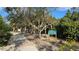 A lovely paved path through the park, near a welcome sign at 9623 Sea Turtle Ter # 201, Bradenton, FL 34212