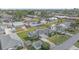 Aerial view of a single-Gathering home with a carport and surrounding neighborhood at 1521 Graber Ave, Sarasota, FL 34239