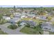 Aerial view showcasing a single-story house, driveway, and surrounding homes at 1521 Graber Ave, Sarasota, FL 34239