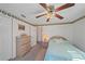 Charming bedroom with light-colored bedding and ceiling fan at 1521 Graber Ave, Sarasota, FL 34239