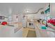 White kitchen with granite countertops and modern appliances at 1521 Graber Ave, Sarasota, FL 34239