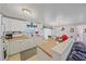 Bright kitchen with white cabinets, granite countertops, and modern appliances at 1521 Graber Ave, Sarasota, FL 34239