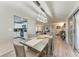 Open concept dining area with kitchen and living room views at 1777 Pomelo Dr, Venice, FL 34293