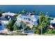Waterfront home with metal roof and lush landscaping at 178 N Washington Dr, Sarasota, FL 34236