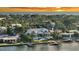 Luxury home on the waterfront with a sunset view; aerial perspective at 178 N Washington Dr, Sarasota, FL 34236