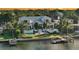 Luxury waterfront home with private pool and dock; sunset view at 178 N Washington Dr, Sarasota, FL 34236